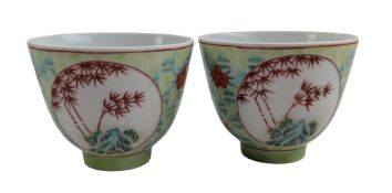 PAIR OF CHINESE COPPER RED & GREEN 'BAMBOO' TEACUP 矾红绿彩竹石图茶杯一对