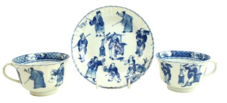 TWO QING DYNASTY BLUE AND WHITE CUPS & A SAUCER 清 康熙青花人物·茶杯和茶碟