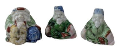 THREE 20TH CENTURY JAPANESE MINIATURE FIGURINES OF LUCKY DEITIES 20世纪日本小瓷人