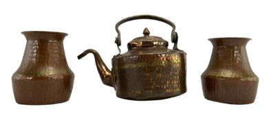 ARTS & CRAFTS THREE PIECE HAMMERED EMBOSSED COPPER TEA SET