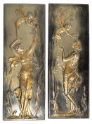 A PAIR OF ART NOUVEAU STYLE BRONZE EFFECT PLASTER WALL PLAQUES