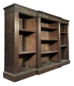 LARGE JACOBEAN REVIVAL 19TH CENTURY CARVED OAK BREAKFRONT OPEN BOOKCASE