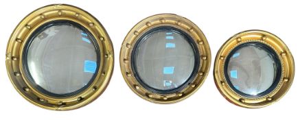 THREE GRADUATING EARLY 20TH CENTURY & LATER WALL CONVEX MIRRORS