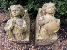 PAIR OF RECONSTITUTED STONE GOTHIC STYLE CORBELS/STATUES IN THE SHAPE OF CHERUBS