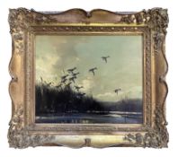 VERNON WARD (1905-1985) - 1946 OIL ON CANVAS LANDSCAPE OF FLYING MALLARDS