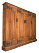 NEO-GOTHIC INSPIRED 20TH CENTURY CARVED OAK & IRON BOUND ECCLESIASTICAL SENTRY BOX