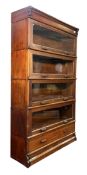 MANNER OF GLOBE WERNICKE - CIRCA 1920S MAHOGANY LAWYERS STACKING BOOKCASE