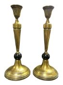 PAIR OF 19TH CENTURY BRASS AND BLACK MARBLE CANDLESTICKS