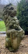 20TH CENTURY RECONSTITUTED STONE GARDEN SCULPTURE OF RAMPANT LION