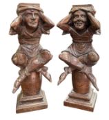 PAIR OF 19TH CENTURY CARVED WOOD FIGURES OF JESTERS IN THE GOTHIC STYLE