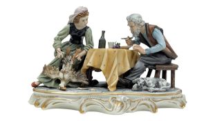 CAPODIMONTE - AN ITALIAN PORCELAIN FIGURE / STATUE DIPICTING DINNER TIME