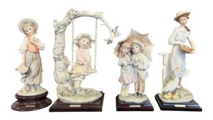 FOUR LATE 20TH CENTURY CAPODIMONTE GIUSEPPE ARMANI RESIN FIGURES