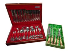 TWO LATE 20TH CENTURY VINTAGE STAINLESS STEEL CUTLERY SETS