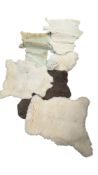COLLECTION OF VARIOUS SHEEPSKIN PELTS & RUGS