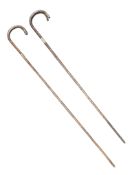 TWO LATE 19TH CENTURY SILVER COLLARED WALKING STICKS