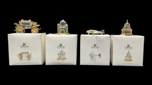 SWAROVSKI - FOUR LATE 20TH CENTURY CRYSTAL GLASS FIGURES FROM THE JOURNEYS COLLECTION
