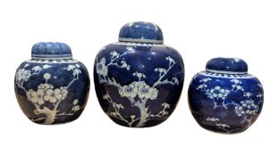 THREE 20TH CENTURY CHINESE PRUNUS BLOSSOM LIDDED GINGER JARS