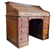 EARLY 20TH CENTURY OAK WOOD TAMBOUR ROLL FRONT DESK