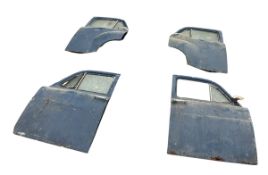 A SET OF FOUR CLASSIC STANDARD CAR DOORS