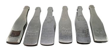SIX VINTAGE 20TH CENTURY NOVELTY ADVERTISING CHAMPAGNE BOTTLE SHAPED PENKNIVES