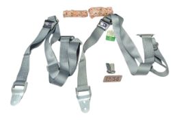 A NEW OLD STOCK SET OF CLASSIC CAR SEATBELTS