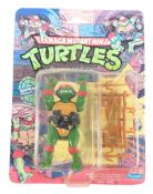 TEENAGE MUTANT NINJA TURTLES - PLAYMATES RAPHAEL CARDED FIGURE