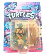 TEENAGE MUTANT NINJA TURTLES - PLAYMATES LEONARDO CARDED FIGURE