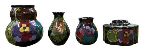 ZUID-HOLLAND GOUDA POTTERY - FOUR EARLY 20TH CENTURY IVORA DECOR VASES