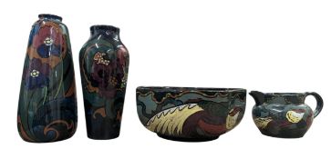 FOUR DECORO POTTERY EARLY 20TH CENTURY FLORAL VASES