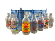 COLLECTION OF APPROX. 24 ADVERTISING MILK BOTTLES