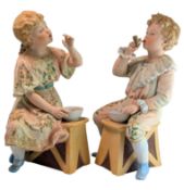 PAIR OF 19TH CENTURY GEBRUDER HEUBACH BISQUE PORCELAIN FIGURES, BLOWING BUBBLES