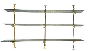 SET OF THREE POST MODERN BRASS & GLASS WALL MOUNTED GRADUATING SHELVES