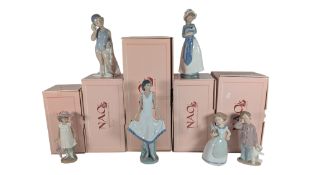 NAO FOR LLADRO - SIX LATE 20TH CENTURY PORCELAIN FIGURES OF LADIES