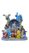 DISNEY - A REPRODUCTION DISNEY SNOW GLOBE FIGURINE