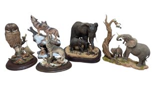 COLLECTION OF RESIN CAST FIGURINES - WOLVES - ELEPHANTS - OWL