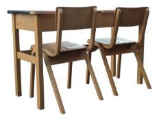 VINTAGE 20TH CENTURY C 1950S OAK VENEER SCHOOL DESK WITH TWO CHAIRS