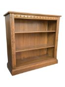 ERCOL FURNITURE - GOLDEN DAWN LATE 20TH CENTURY ELM BOOKCASE