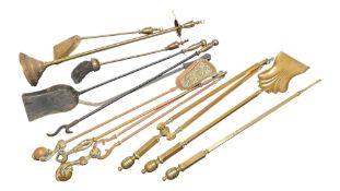 A COLLECTION OF FOUR SETS OF 20TH CENTURY FIRESIDE COMPANIONS