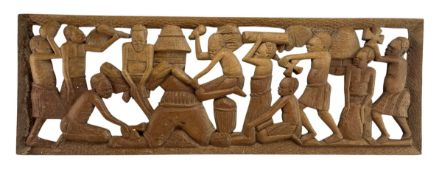 A 20TH CENTURY AFRICAN TRIBAL CARVED WOODEN PANEL