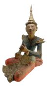 THAI SOUTH EAST AISAN PAINTED CARVED WOOD FIGURE OF A MUSICIAN