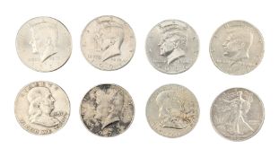 EIGHT 20TH CENTURY UNITED STATES OF AMERICA HALF DOLLARS