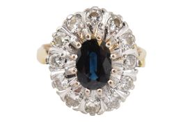 1970S HALLMARKED 18CT GOLD & DIAMOND HALO RING