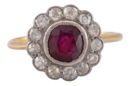 EARLY 20TH CENTURY RUBY & DIAMOND HALO RING