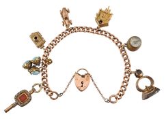 9CT GOLD CHARM BRACELET WITH GOLD & METAL CHARMS