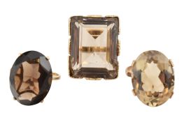 THREE HALLMARKED 9CT GOLD SMOKY QUARTZ COCKTAIL RINGS