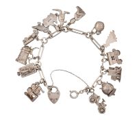 A VINTAGE SILVER CHARM BRACELET