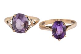 TWO 9CT GOLD & AMETHYST SOLITAIRE RINGS