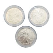 THREE 1990S UNITED STATES FINE SILVER ONE DOLLARS