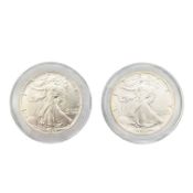 TWO 1980S UNITED STATES FINE SILVER ONE DOLLARS