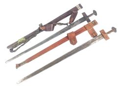 TWO MID 20TH CENTURY NORTH AFRICAN TUAREG SWORDS